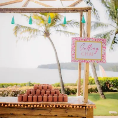 A "Cutting Chai" station set up by the water, with traditional clay kullads ready for serving. This adds a wonderfully authentic and rustic Indian touch to any event.
