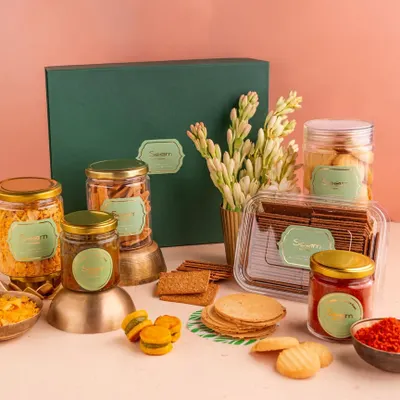 Chai. Gupshup. Snacks to match. My Chai & Gupshup Hamper brings comfort and conversation together, filled with a variety of tea-time snacks, chutneys, and more.