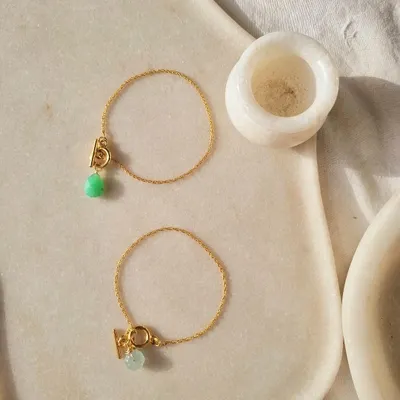My toggle bracelets offer a different style of personalization. This set includes the 'aṃahú' Chrysoprase bracelet to mend a broken heart and the 'nárūra' Aquamarine bracelet to bring soothing calm.