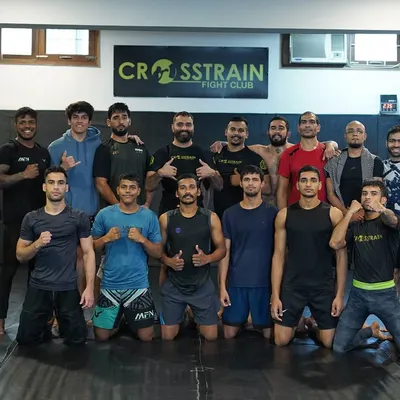 This is my family at Crosstrain Fight Club. We are a team of dedicated fighters and coaches who support each other on and off the mats.