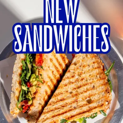 Presenting our new lineup of No-Bullsh*t Sandwiches. Each one is crafted with unique flavour combinations and our freshly baked bread, like this grilled Avocado & Tomato sandwich.