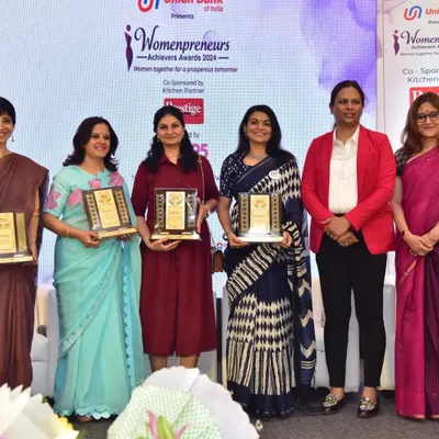 I was so happy to receive the "Womenpreneur Achievers Award 2024" on Women's Day. This picture shows me on stage with other incredible women entrepreneurs, a moment of shared success and inspiration.