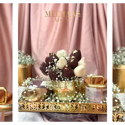 With strawberries and Valentine's Day in season, this chocolate-dipped strawberry bouquet is the perfect romantic gesture. Arranged in a golden vase, it's a gift that is both beautiful and delicious.