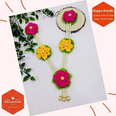 Introducing my 'Kanthi for Bappa', a special small garland for your Ganpati idol. It is handmade, washable, and can be customized with different flower colors like pink, yellow, or red.