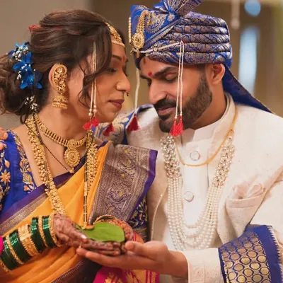 A quiet, intimate moment between the bride and groom during their Marathi wedding rituals. We focus on capturing the deep connection amidst the traditional ceremonies.