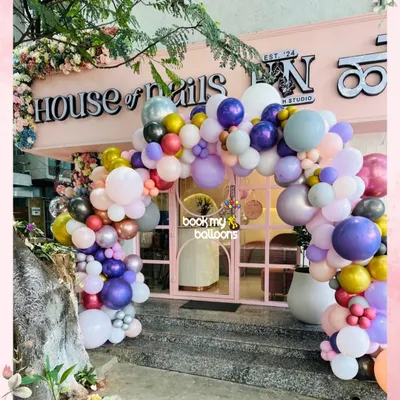 For the grand opening of House of Nails, we designed this vibrant balloon arch using a mix of pastel and metallic chrome balloons. The design was crafted to complement the salon's branding and create a welcoming, Instagram-worthy entrance.