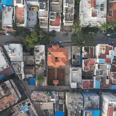 An aerial view showing how the traditional Mangalore tile roof of the Basavanagudi house stands out as a natural element amidst the concrete jungle of the city.