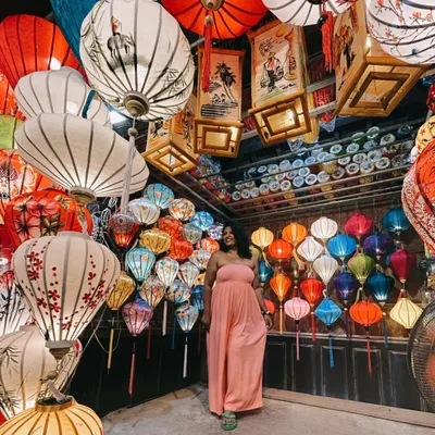 I could stay in this city forever. Hoi An, with its magical lanterns, was the perfect backdrop for this comfortable and chic pink jumpsuit. I can help you plan a vacation wardrobe that is both photogenic and practical.