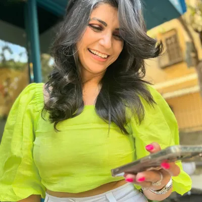 Who says you have to hide your greys? We embraced this client's natural silver streak, making it the star of her new haircut. This is what I call chic grey blending, a style that is modern, confident, and uniquely you.