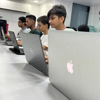 The energy in our classroom is all about focus and growth. Here you can see our students deeply engaged in coding, learning the skills that will shape their futures.