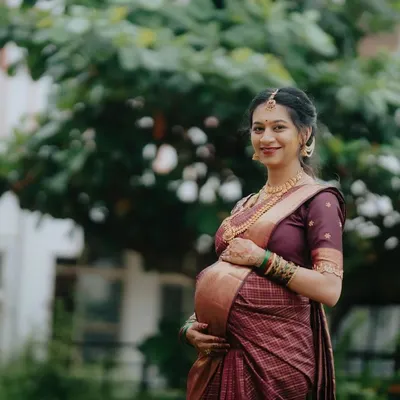A beautiful portrait of mom-to-be Chandana for her Seemantha. The makeup is intentionally minimal and traditional, focusing on clean skin and a happy, radiant glow that feels comfortable to wear.