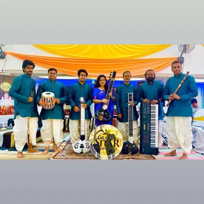 Our seven-piece ensemble, dressed in traditional kurtas, ready for a performance. We bring a respectful and authentic presence to religious and cultural gatherings.