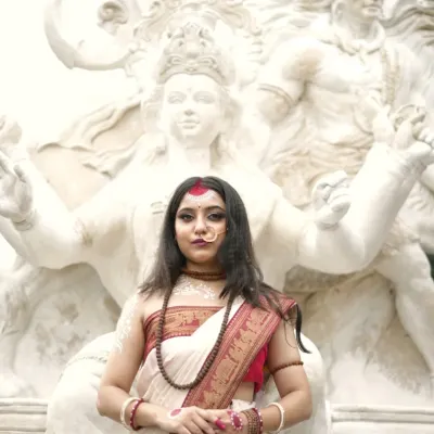 Embodying the divine feminine. This powerful portrait is from a conceptual series inspired by Goddess Parvati, capturing her strength and grace in front of a magnificent sculpture of Lord Shiva.