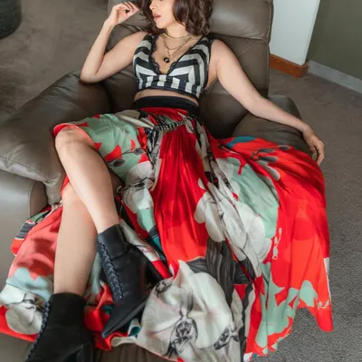 Nushrratt Bharuccha ready for a pool party. I paired a graphic print skirt with a striped crop top and combat boots for an edgy, unexpected look.