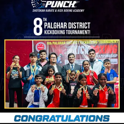 The entire Sweat N Punch team celebrating their well deserved victories at the district championship. This group photo captures the pride and camaraderie that defines our academy.