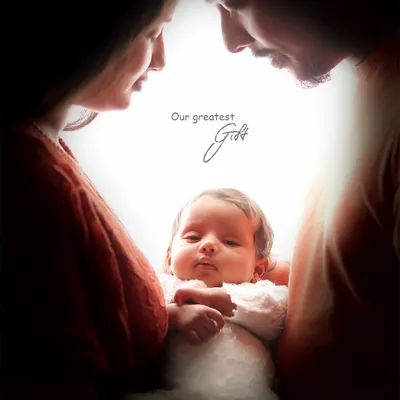 The moment your family grows by two tiny feet. We capture this profound connection as you hold your greatest gift, creating a timeless portrait that is all about the love that now fills your arms.