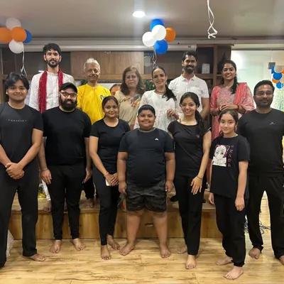 Welcome to the Nikki Yoga Studio family. This group photo from our Yoga Day celebration shows the diverse and close-knit community that practices together and supports one another.