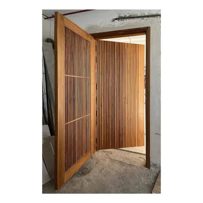 This solid teak entry screen and main door create a powerful first impression. I design entry interfaces that are not just doors, but handcrafted statements about the quality and care invested in the home.