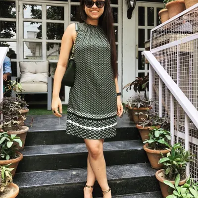 A perfect look for a birthday lunch or a summer day out. This green printed A-line dress is effortless and stylish, especially when paired with simple black heels and sunglasses.