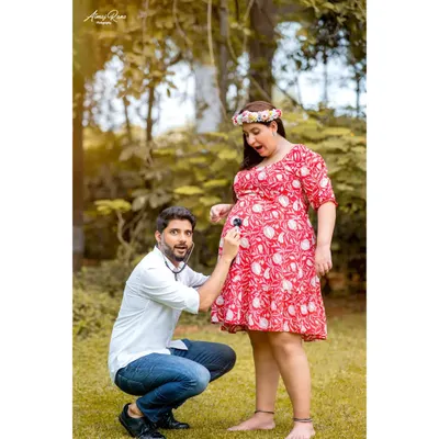 Who says maternity shoots have to be serious? This fun-loving couple chose a playful theme, with the dad-to-be using a stethoscope to "check on" the baby, resulting in a memorable and funny photo.