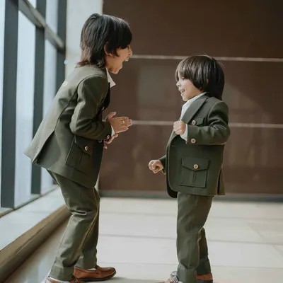 When your brother is your first best friend and your built-in style twin. Prish and Aarsh are having fun in their matching olive green shacket sets, personalized just for them.