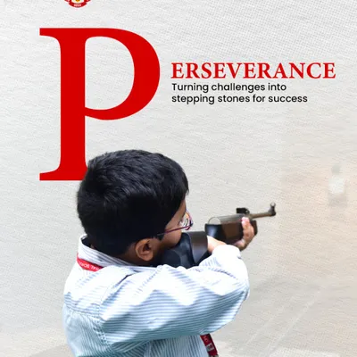 We teach perseverance by turning challenges into stepping stones for success. A student takes aim in our 10m shooting range, demonstrating the focus and discipline we instill through sports.