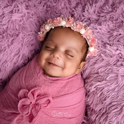 The pure joy of a perfectly captured newborn smile. Learning to anticipate and capture these fleeting expressions is a key part of my 2-day deep dive workshop.