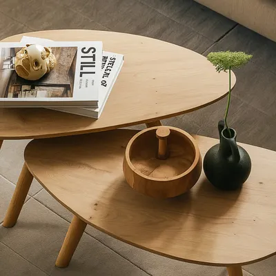 A beautifully styled shot of my nested oak coffee tables. Their organic shape and simple design allow the natural beauty of the wood to stand out, perfect for a contemporary home.