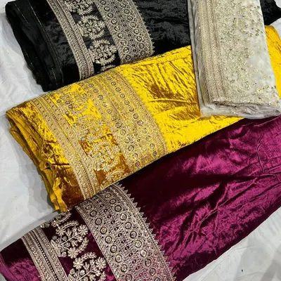 Here is a selection of my embroidered viscose velvet fabrics in rich jewel tones. You can see the heavy, intricate border work on the black, yellow, and maroon options, perfect for winter weddings.