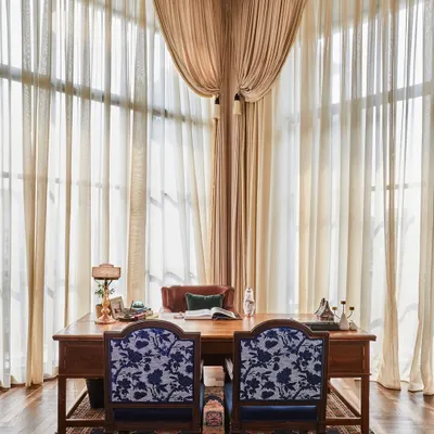 In the founder's cabin of the Maddock office, we blended antique finds with personal history. The centerpiece is a magnificent 8-foot antique desk, complemented by the founder's very first office chair, which we retained for sentimental value. The space is a narrative of the company's journey.