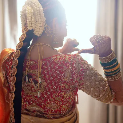 The back of a bridal blouse is just as important as the front. For Sonal Monteiro's wedding, I designed this intricate pattern with heavy zardosi and beadwork, ensuring she looked stunning from every angle.