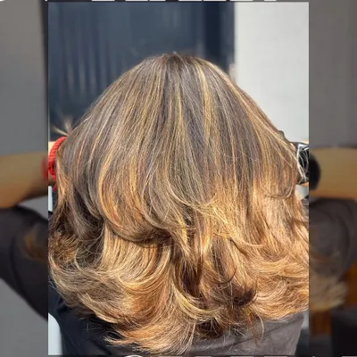 Just one appointment, and endless compliments. This is a perfect example of my balayage technique, creating beautiful, blended highlights on a shoulder-length cut.