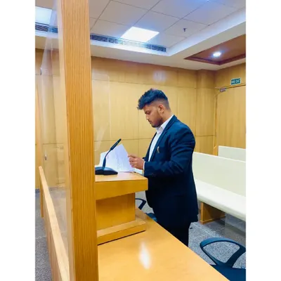 Standing at the podium, presenting arguments in the courtroom. This is where preparation meets performance, and where I fight to make my client's voice heard.