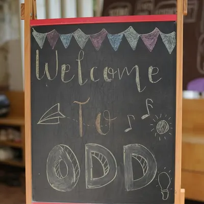 A cheerful chalkboard sign welcomes everyone to our center. I believe in creating a warm and inviting atmosphere from the moment you walk in the door.