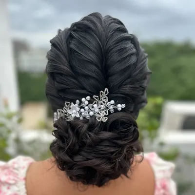 A beautifully intricate textured updo, perfect for a Christian bride or a reception look. I teach how to create these soft, overlapping textures for a romantic finish.