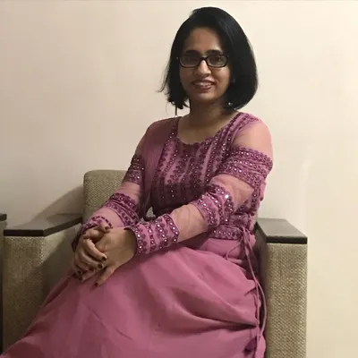 This is me, trying to pose for a picture during Diwali. CozMHappy started from my own love for art as a way to relax, and I'm so happy I get to share that feeling with all of you through my workshops.
