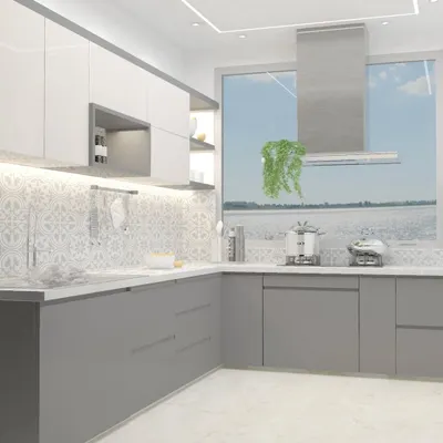 This bright and airy kitchen features two-tone cabinets in grey and white, with a patterned tile backsplash that adds personality. The large window provides ample natural light, making the space feel open and welcoming.