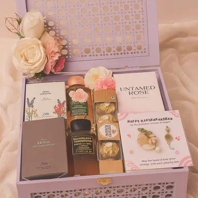A perfect Rakhi gift for your Bhaiya and Bhabhi. This luxurious lavender box includes matching Zara perfumes, Bath & Body Works shower gels, Ferrero Rocher, a reed diffuser, and a beautiful couple rakhi set.