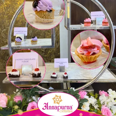 A display of our mini desserts, including blueberry cupcakes, strawberry tarts, and cherry chocolate fudge. These bite-sized treats are perfect for satisfying a sweet tooth.