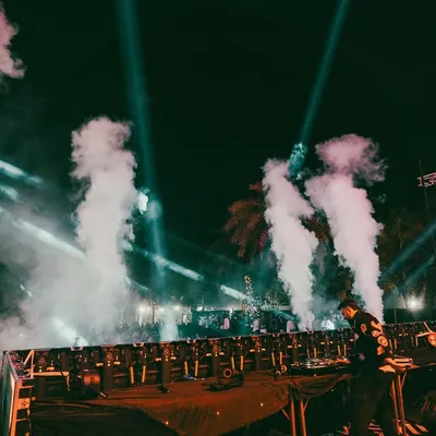 The calm before the storm, surrounded by CO2 cannons and stage lights. This is my office, and I'm ready to make it an unforgettable night.