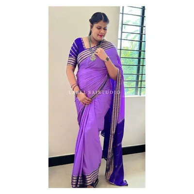 This is a pure Mysore crepe silk saree in a trending lavender and royal blue combination. It is a 120 GSM thickness material with a beautiful flower border, a design in which we have sold many other color combinations.