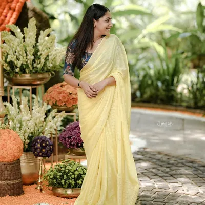 The beautiful actress looking absolutely radiant in a simple, elegant yellow saree from my collection. The way the light catches the fabric shows how lovely and comfortable it is to wear.