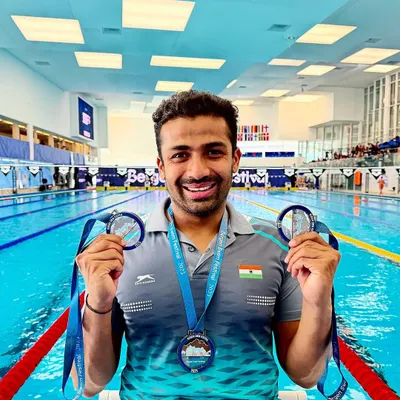 Our phenomenal para swimmer, Niranjan Mukundan, showcasing his 2 silver and 1 bronze medals from the Bergen Swim Festival in Norway.