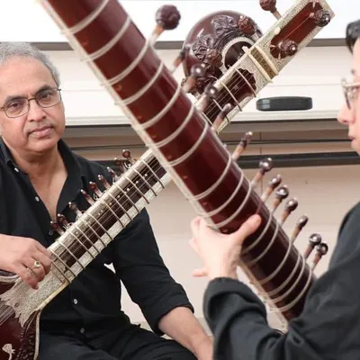 Teaching is about sharing a tradition that is larger than any one of us. Here I am during a masterclass in Niigata, Japan, guiding a dedicated student through the nuances of the sitar and the Maihar parampara.