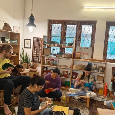 A wide view of our sewing circle, where parents came together to create a special canopy for our graduating children. This is what community looks like: hands and hearts working together with shared purpose.