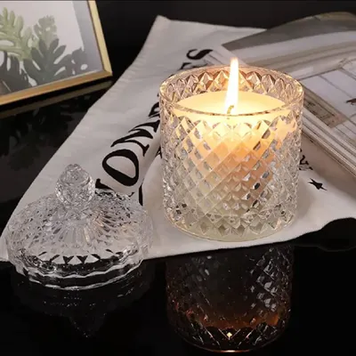 Elevate your gift with this premium glass candle. The intricate diamond-cut pattern and warm glow add a touch of luxury and sophistication to any space.