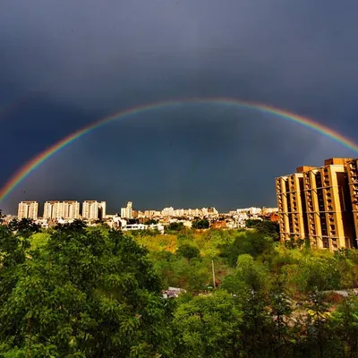 A rare double rainbow captured from my balcony in Gurgaon. This image demonstrates my approach to landscape photography, focusing on dramatic light and composition to capture a fleeting, powerful moment in nature.