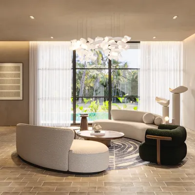The central conversation area at the Siroi Lilly villa is a study in balanced comfort. I paired the inviting texture of bouclé couches with a soothing beige palette and a delicate, sculptural chandelier to create a space that is peaceful, functional, and beautiful.