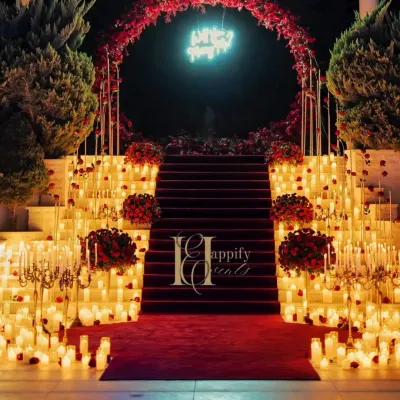 A full view of the grand Karjat proposal setup by the pool. The combination of the red carpet, candlelit stairs, and a circular floral arch with a neon sign creates a truly spectacular and memorable scene.