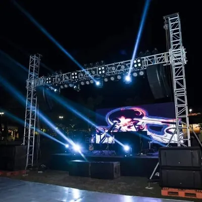 A massive stage setup for a New Year's Eve gala at The Ranch. For large outdoor events, I bring in heavy-duty sound and light trusses to create a concert-level experience.